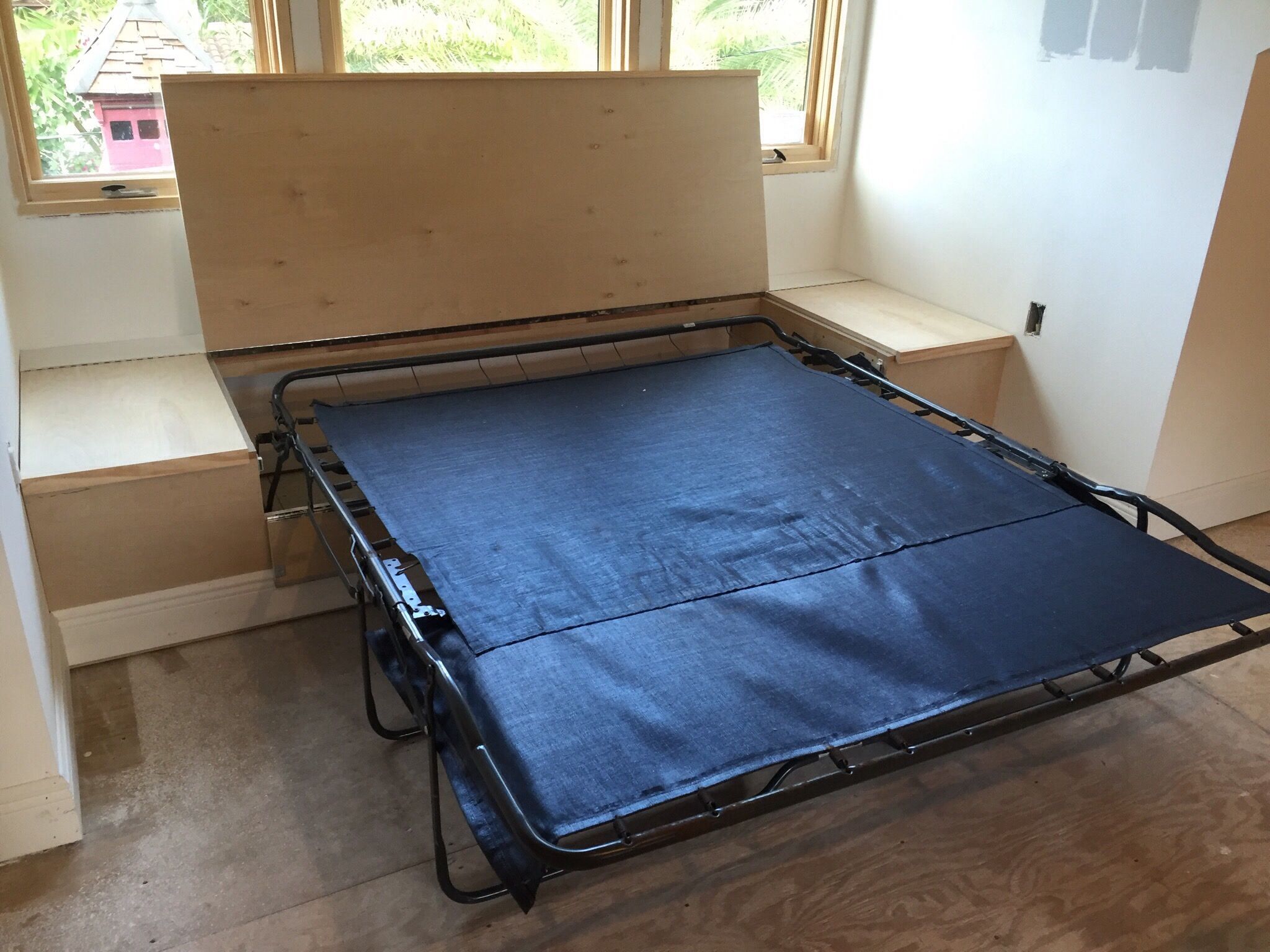 Hide your guest bed in plain sight when not in use.