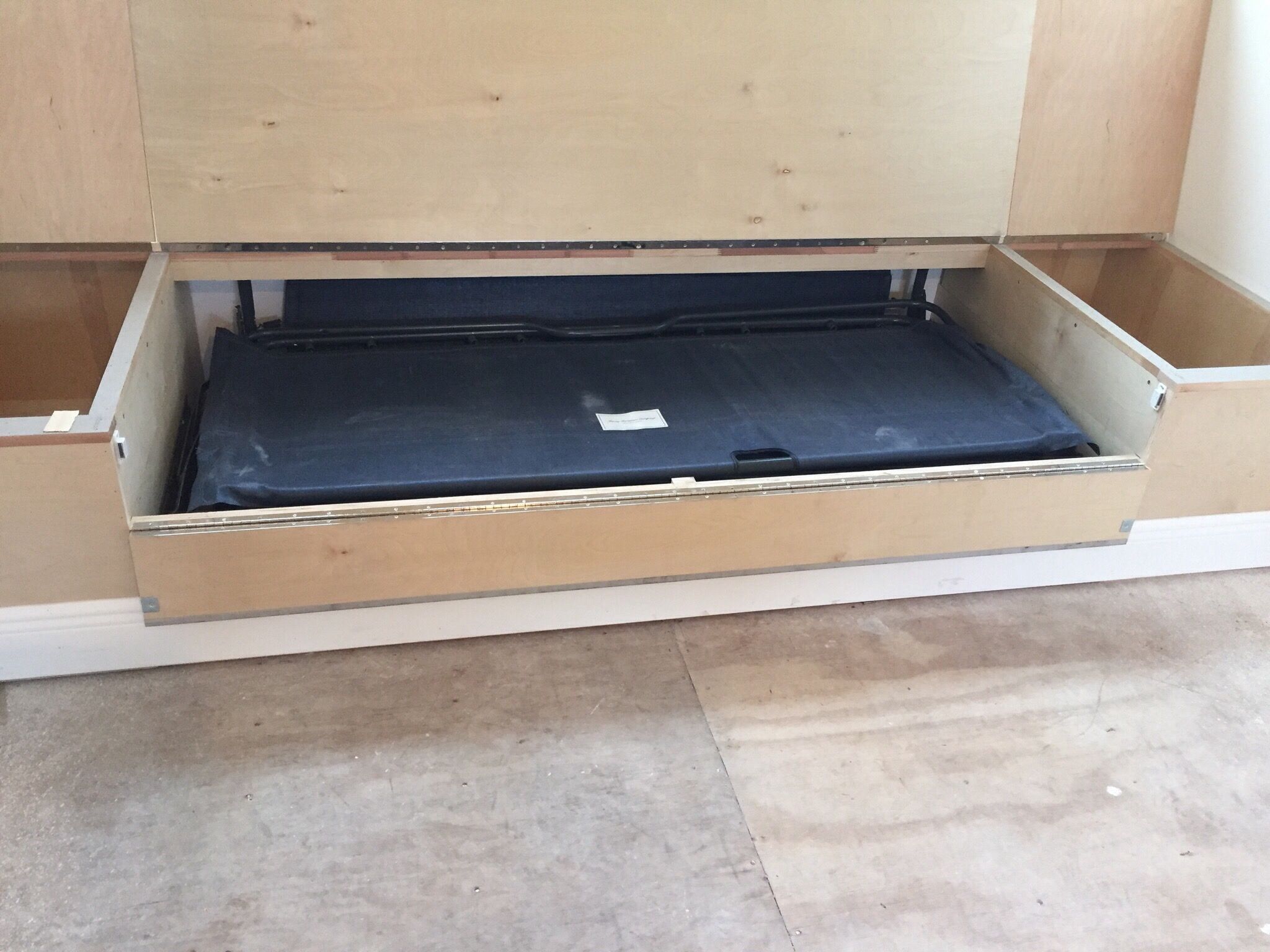 Example of a twin-size sleeper mechanism installed in a window bench.